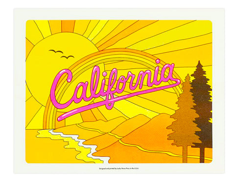 CALIFORNIA SUNSET IN ORANGE AND YELLOW WITH TREES AND THE COASTLINE TEXT READS CALIFORNIA IN HOT PINK