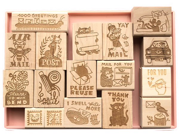 very fun quirky stamp designs from Germany. centipede with text 1000 greetings. air mail bee with envelope. rabbit with envelope between ears.