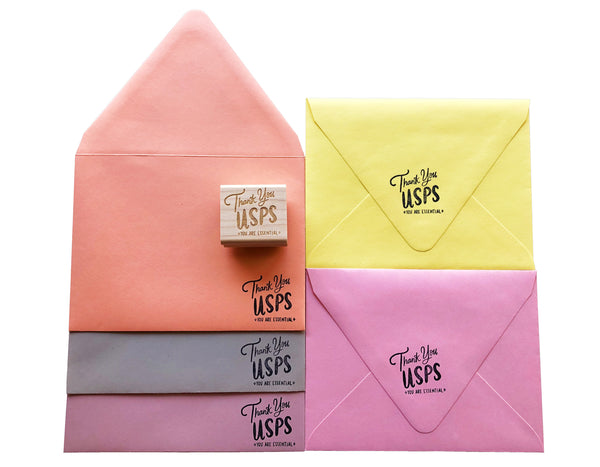 A variety of colorful envelopes stamped with Thank you usps