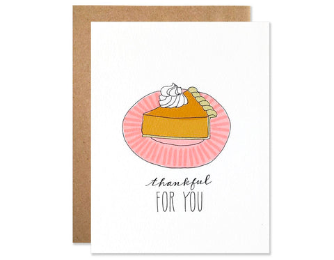 piece of pumpkin pie with whipped cream on pink plate text reads thankful for you