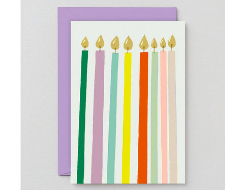 colorful lit candles, no text