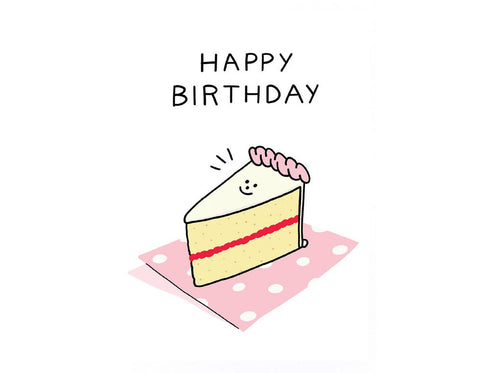 white background piece of smiling birthday cake text reads happy birthday. cake slice on pink polka dot napkin