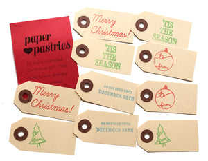 set of 10 hand stamped gift tags 5 different designs 2 tags each. merry christmas, 'tis the season, ornament to and from, do not open until december 25, tree outline to from 