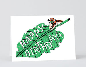 leaf with caterpillar, letters eaten out of leaf spell out happy birthday!