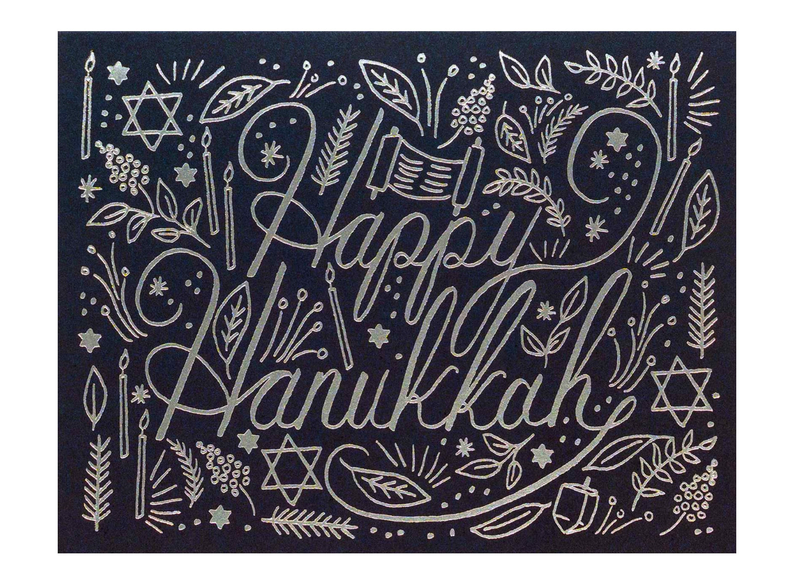 navy background silver foil printed text reads happy hanukkah