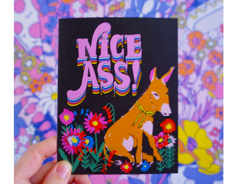 black background text reads nice ass with donkey sitting in flowers