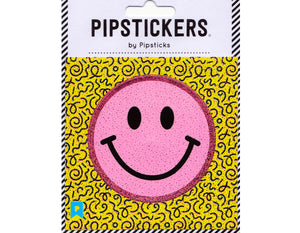 round sticker pink happy face with black eyes and smile