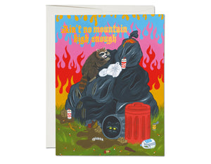 technicolor fire/flames background with raccoon on pile of trash bags text reads ain't no mountain high enough