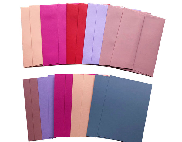 set of envelopes and cards in hot pink, lavender, bright red, dusty rose and dusty blue.